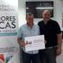 Entrega del cheque de 1.000€ al ganador de la promoción de Mayo